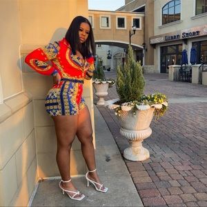 Red multi color romper ( Fashion Nova )